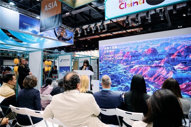  “中國館”新疆旅游推介會現場介紹。楊浩鵬攝