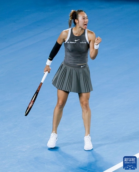 鄭欽文在比賽中慶祝得分。新華社記者 馬平 攝